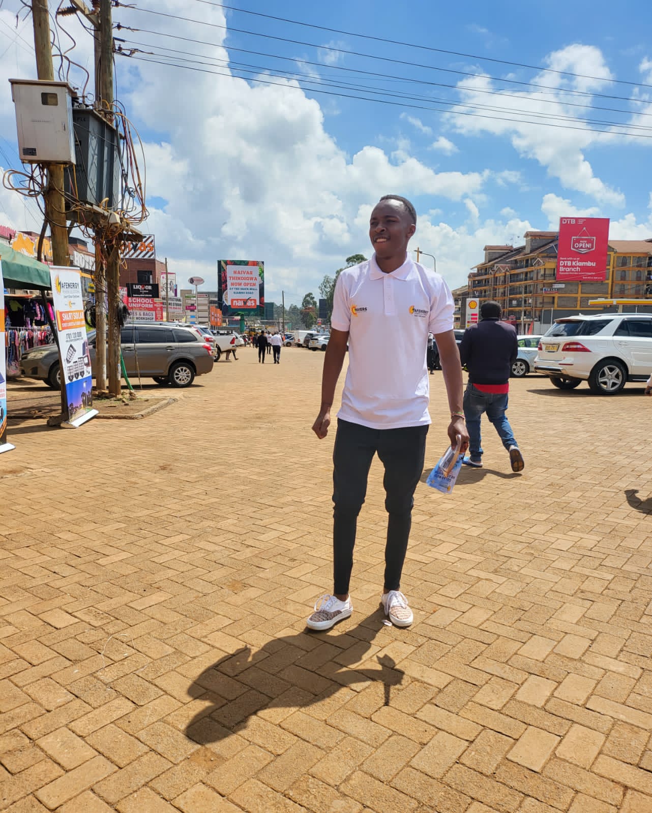 AFENERGY brand ambassador distributing flyers along Kiambu Road